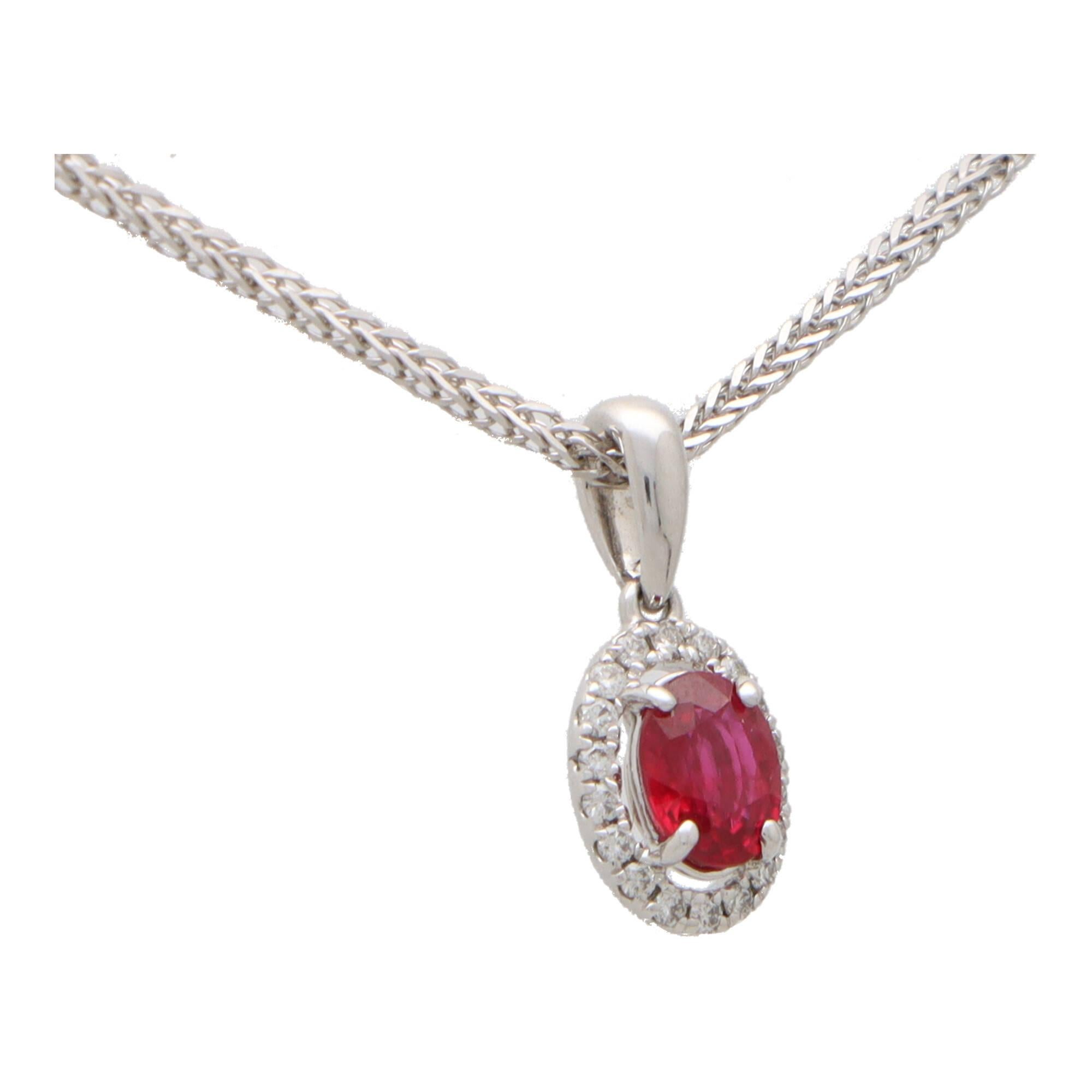 Modern  Ruby and Diamond Oval Halo Pendant Necklace Set in 18k White Gold For Sale