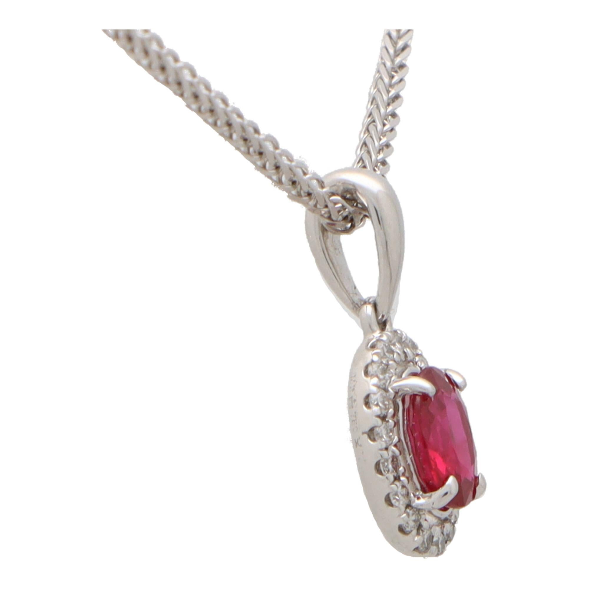 Oval Cut  Ruby and Diamond Oval Halo Pendant Necklace Set in 18k White Gold For Sale