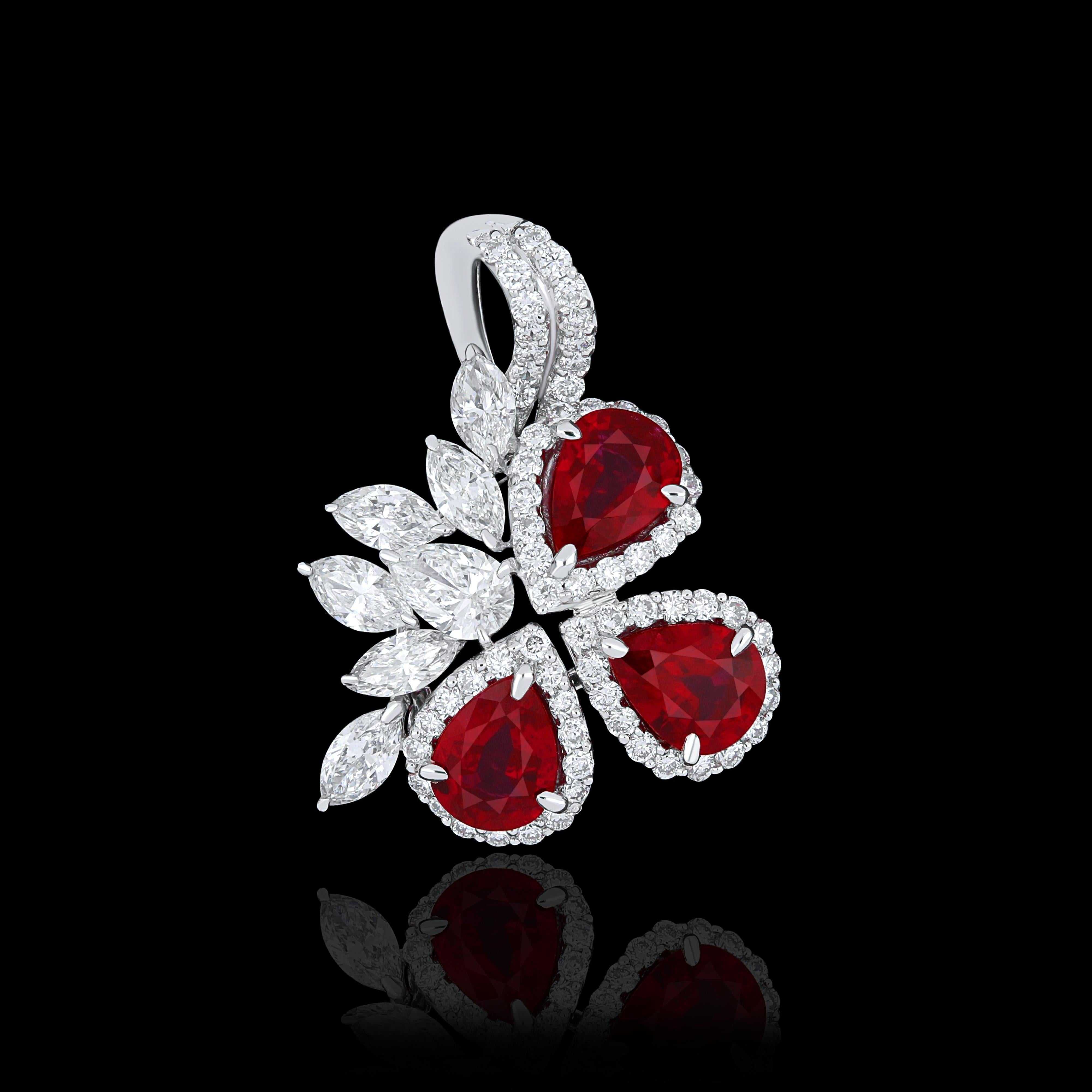 Elegant and exquisitely detailed 18 Karat White Gold Pendant, center set with 0.86Cts .Pear Shape Ruby  and micro pave set Diamonds, weighing approx. 0.71Cts Beautifully Hand crafted in 18 Karat White Gold.

Stone Detail:
Ruby: 5x4MM

Stone