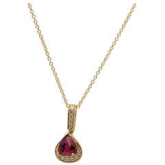 Ruby and Diamond Pendant in 18 Karat Yellow Gold