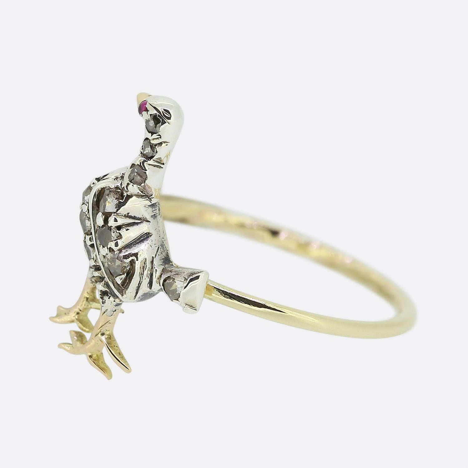 Here we have a quirky endearing piece from originally dating back to the Victorian era. The head of the ring has been expertly crafted from silver into the shape of a pheasant bird showcasing all iconic features; the body of which has been adorned