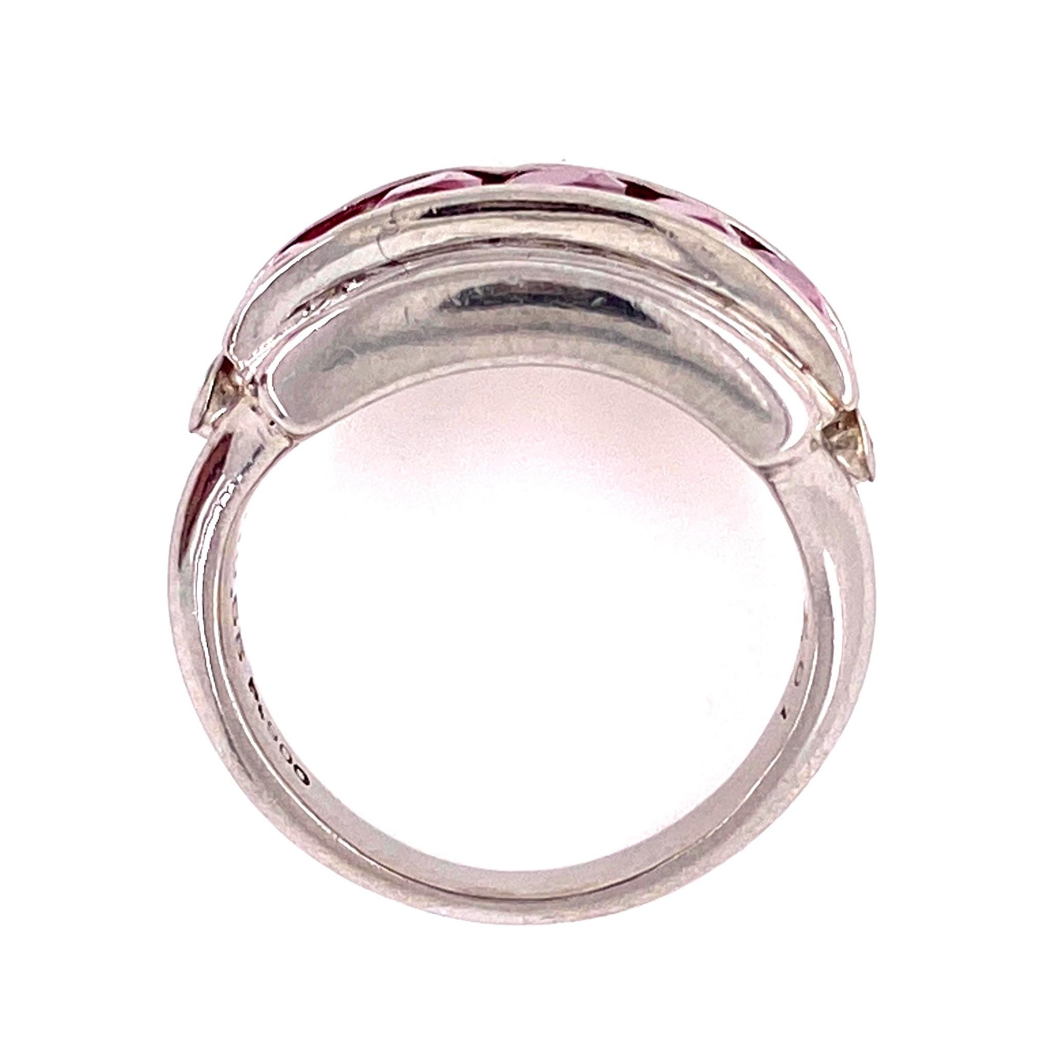 Simply Beautiful Platinum Cocktail Band Ring, securely set with 5 Fine high quality French cut Rubies, weighing approx. 2.07 total carats and Diamonds weighing approx. 0.65 total carat. Hand crafted in Platinum. Measuring approx. 0.75”w x 0.39”h x
