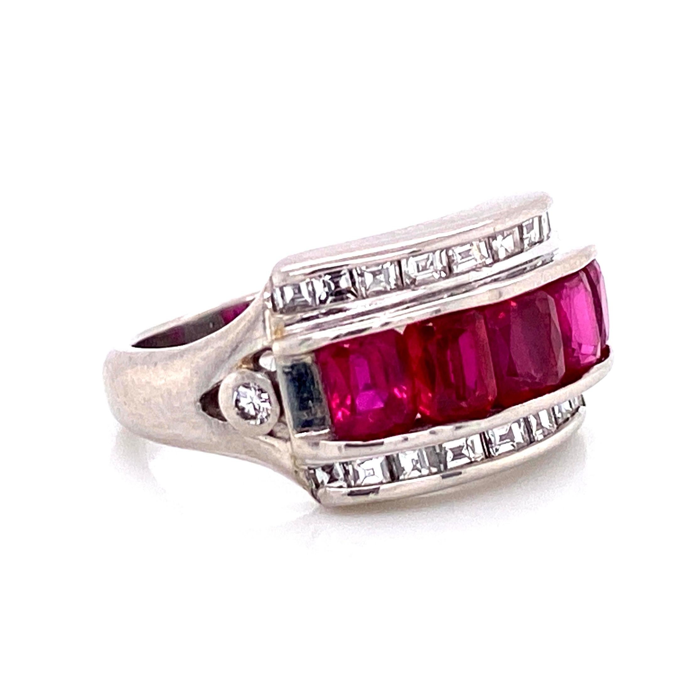 Simply Beautiful! Platinum Cocktail Band Ring, securely set with 5 Fine high quality French cut Rubies, weighing approx. 2.07 total carats and Diamonds weighing approx. 0.65 total carat. Hand crafted in Platinum. Measuring approx. 0.75”w x 0.39”h x