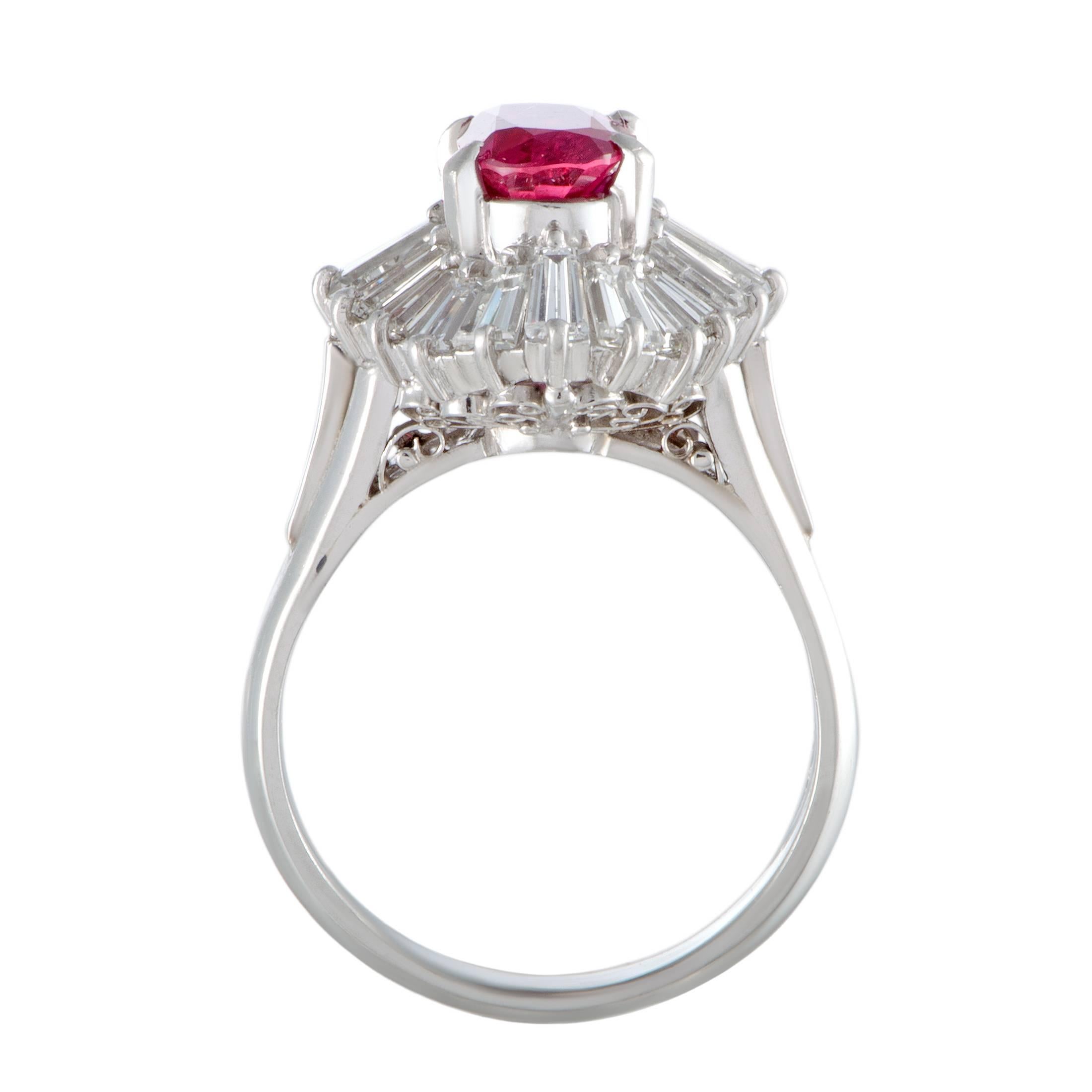 A majestic ruby is beautifully set amidst a plethora of scintillating diamonds in this spellbinding ring that is masterfully crafted from stylish platinum. The ruby weighs 1.88 carats and the diamonds amount to 1.87 carats.
Ring Top Dimensions: 17mm