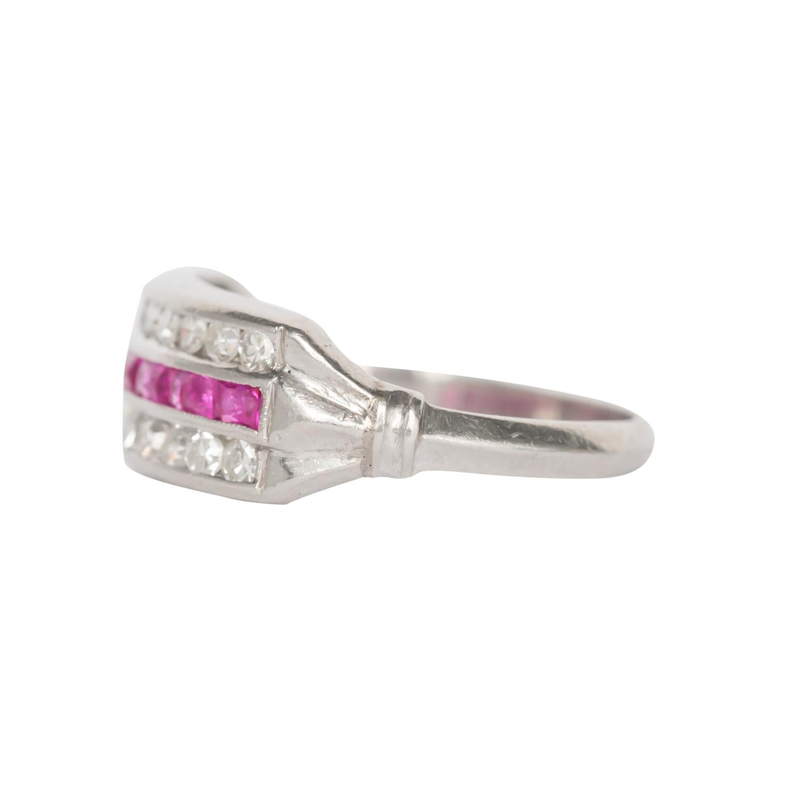 Item Details: 
Ring Size: 6
Metal Type: Platinum
Weight: 3.4 grams

Diamond Side Stone Details: 
Shape: Antique Single Cut
Total Carat Weight: .25 carat, total weight
Color: F
Clarity: VS

Color Stone Details: 
Type: Natural Ruby
Shape: French