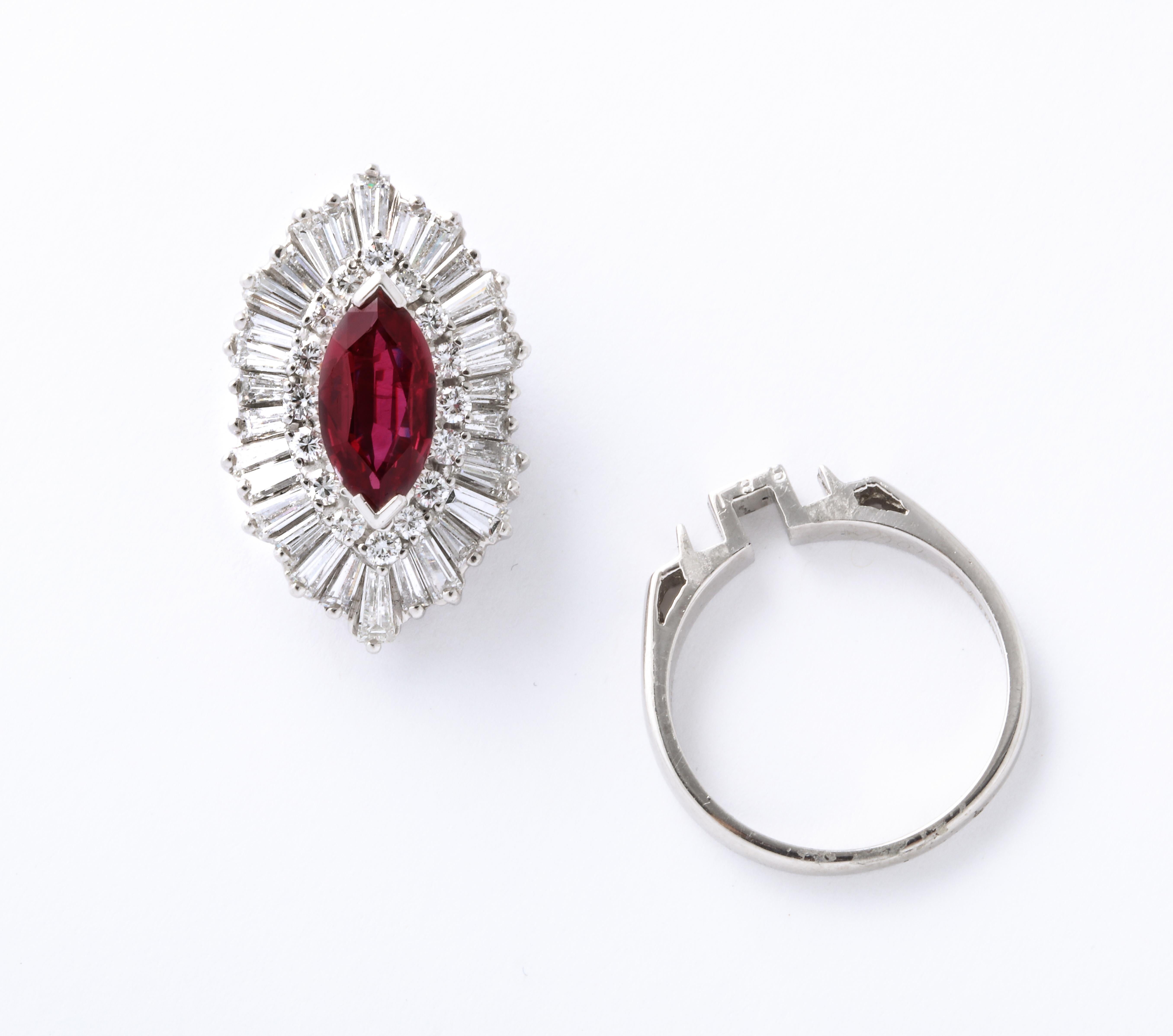 
A beautiful versatile piece! 

1.86 carat fine marquise shape Ruby

3.70 carats of white round brilliant and baguette cut diamonds. 

Set in platinum. 

The Ruby and Diamond portion of the ring can be removed to be worn as a pendant.  