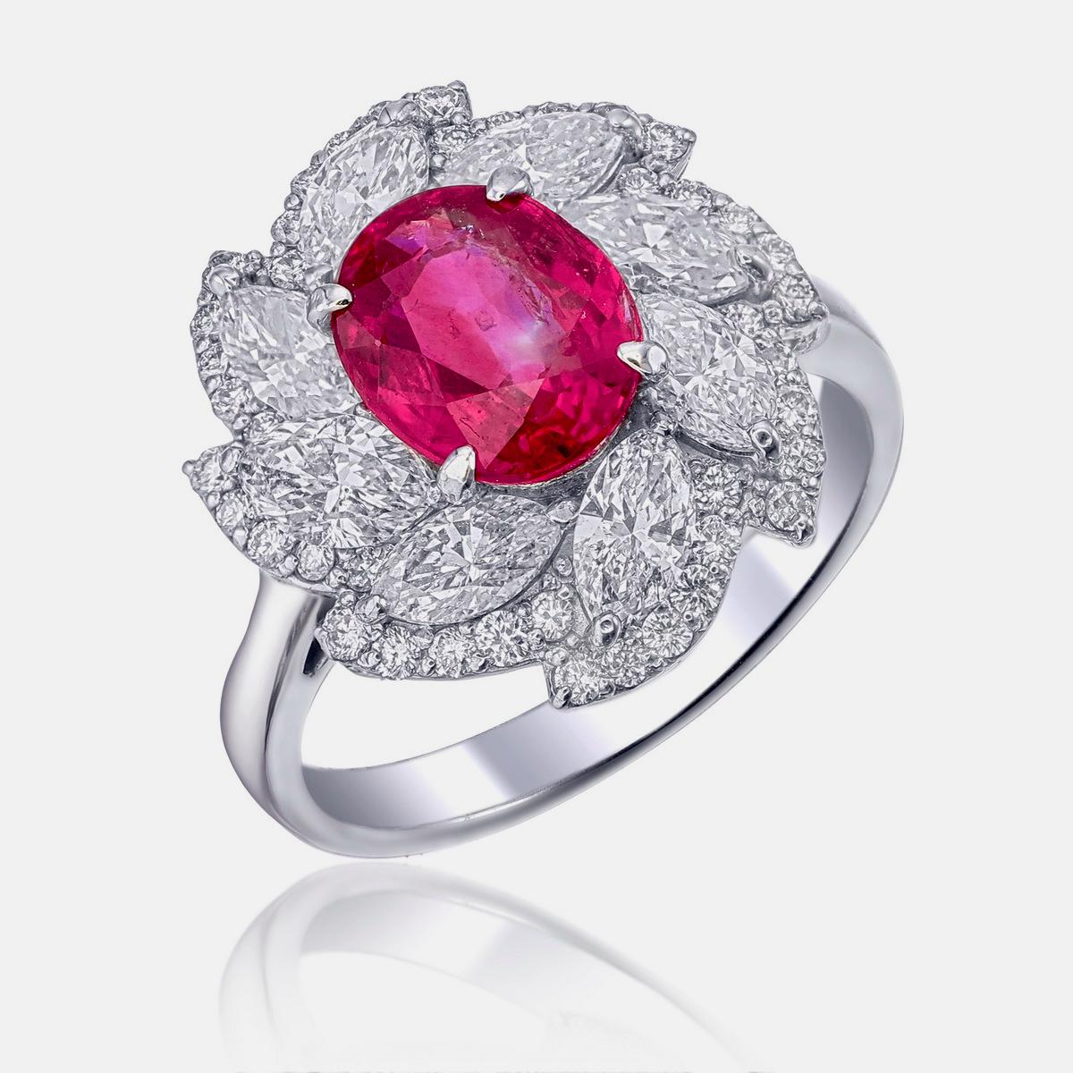 This ruby and diamond ring by Rewa Jewels features a classic design that is versatile enough for any occasion. The center stone is a 1.94-carat Burmese ruby, completely untreated with no heat enhancement, and comes with a certificate from the