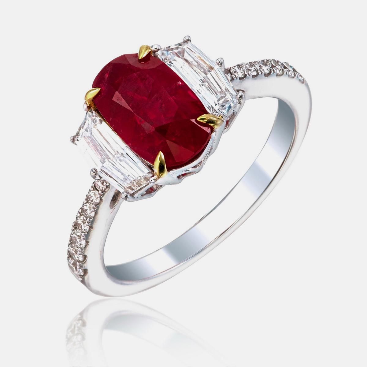 This ruby and diamond ring by Rewa Jewels features a timeless design, suitable for any occasion. The center stone is a 2.26-carat Burmese ruby, certified by Gem Research Swisslab (GRS) with a 'Pigeon Blood' rating for its vivid red color and no heat