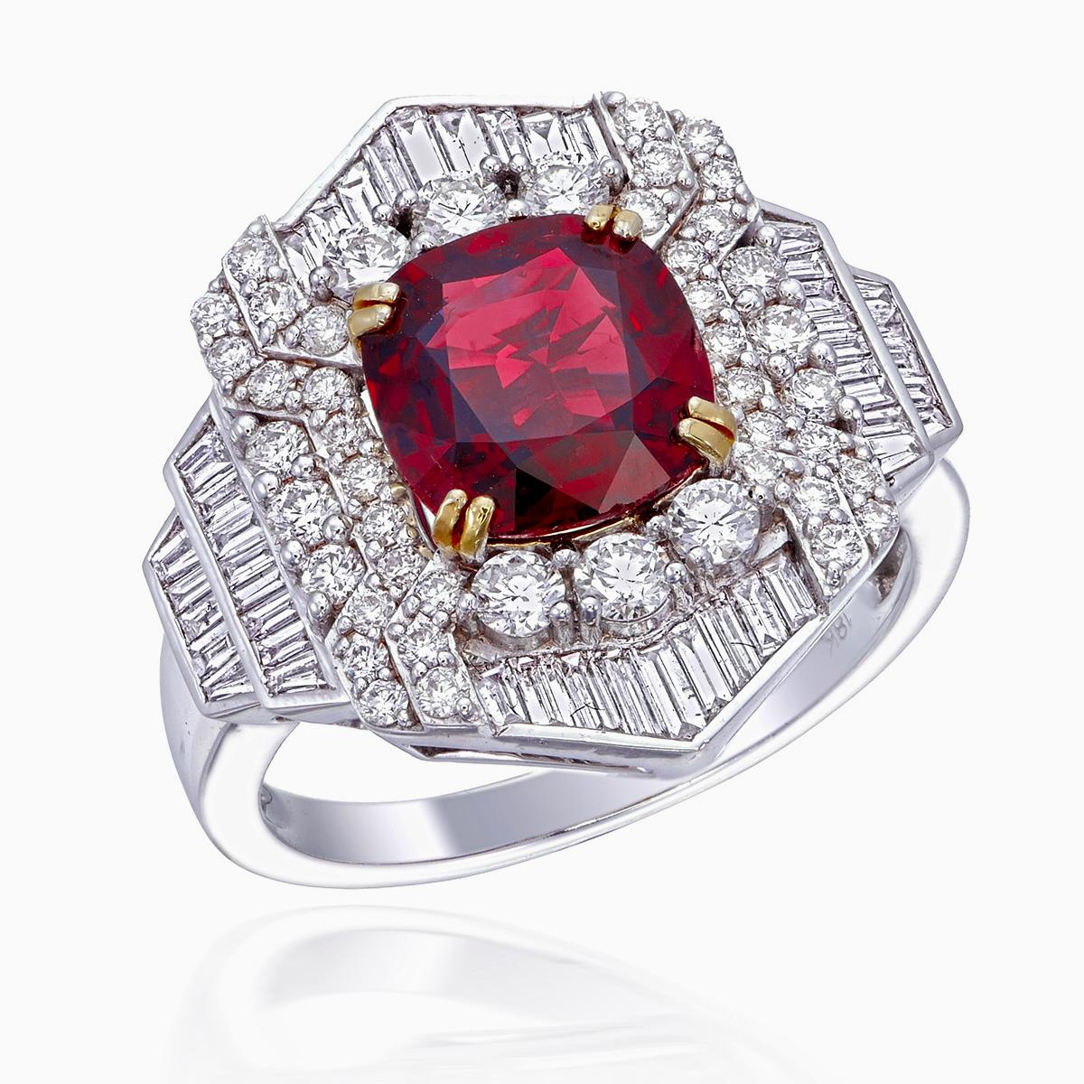 Introducing a brand new ruby and diamond ring by Rewa Jewels. This ring has been inspired by traditional Art Deco themes through it's symmetrical designs and traditional shaped such as rounds, baguettes, and cushions.

The center stone is a