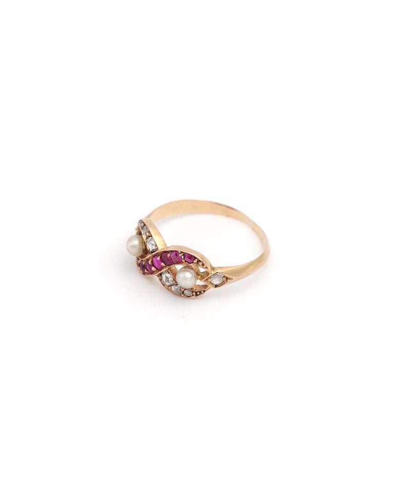 Infinity love ruby and diamond ring in 18k gold, natural pearls
