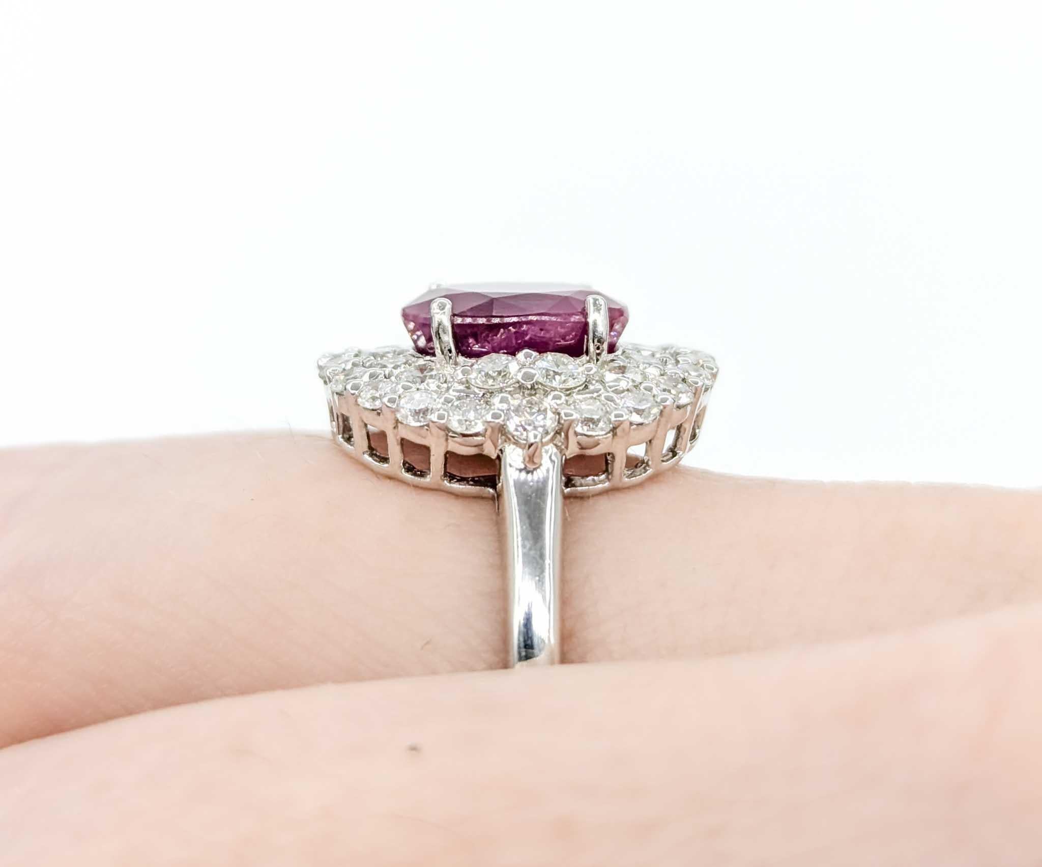 Stunning Ruby and Diamond Ring in Platinum

Introducing this beautiful ruby ring, crafted in platinum. The ring features a 2.82ct GIA Burmese ruby centerpiece with .90ctw round diamonds and a double halo design, creating a breathtaking and luxurious