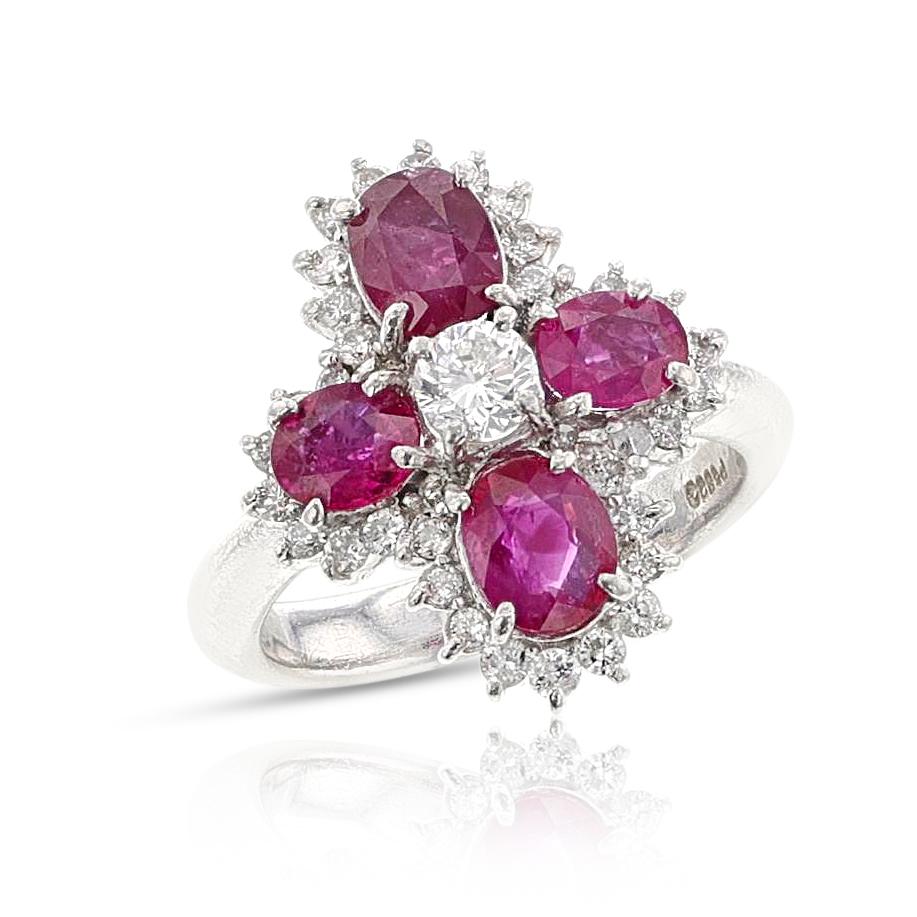 A Ruby and Diamond Ring made in Platinum. The rubies weigh 2.85 carats and diamonds weigh 0.70 carats. The total weight of the ring is 10.28 grams. Ring Size US 5. 