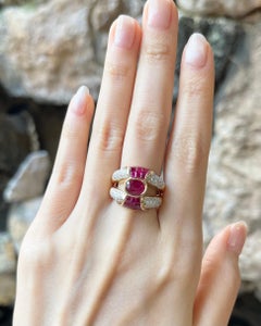 Ruby and Diamond Ring set in 18K Gold Settings