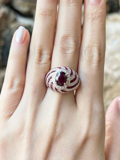 Ruby and Diamond Ring set in 18K Gold Settings
