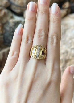 Ruby and Diamond Ring set in 18K Gold Settings