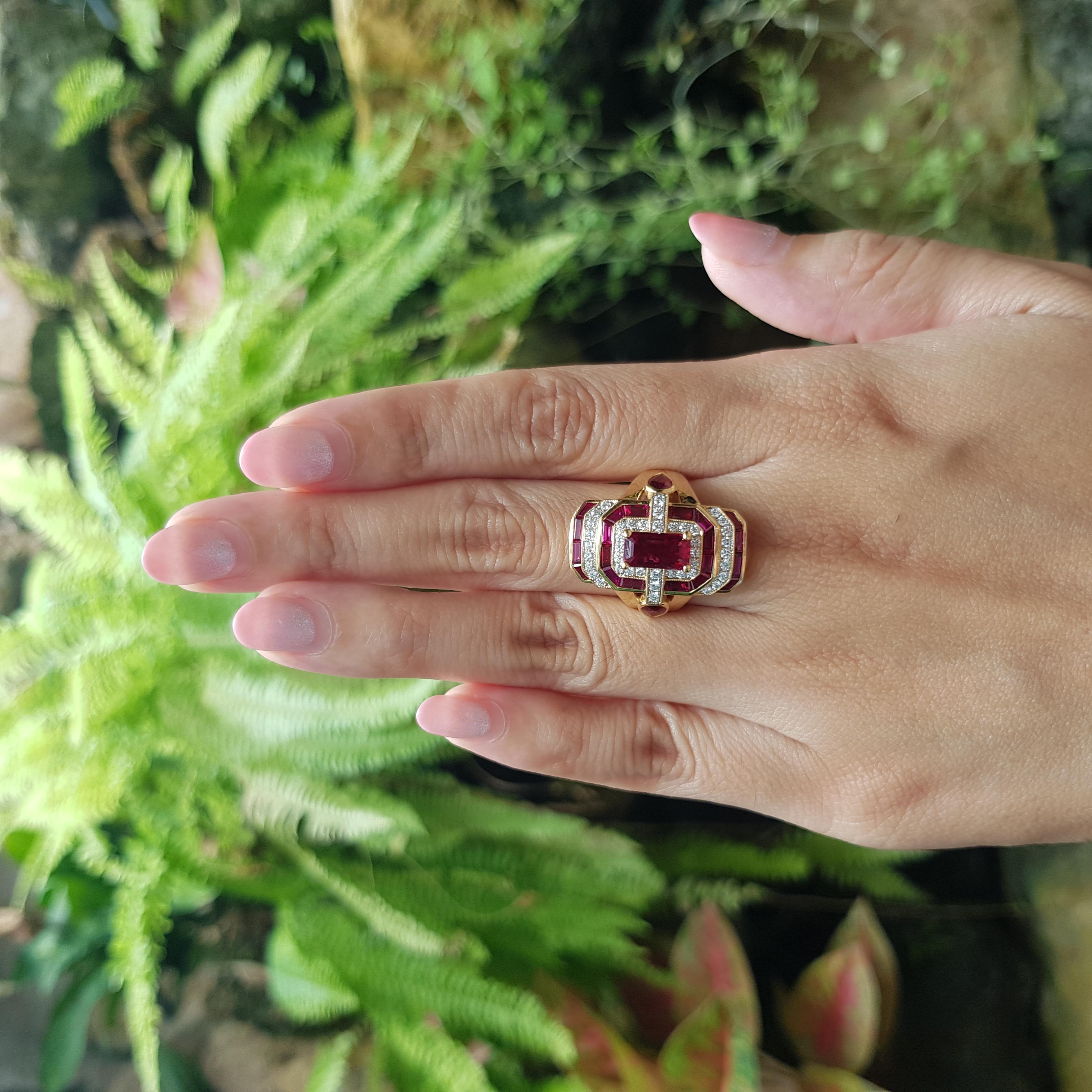 Ruby 1.65 carats, Ruby 2.58 carats and Diamond 0.45 carat Ring set in 18K Gold Settings

Width:  1.2 cm 
Length: 2.3 cm
Ring Size: 54
Total Weight: 12.84 grams

