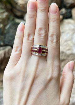 Ruby and Diamond Ring set in 18K Gold Settings