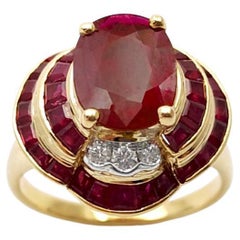 Ruby and Diamond Ring set in 18K Gold Settings
