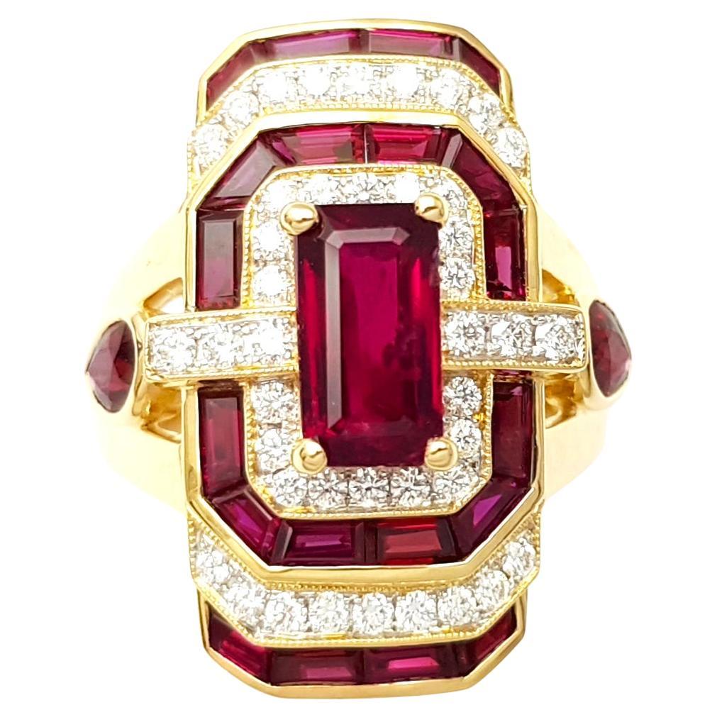 Ruby and Diamond Ring set in 18K Gold Settings