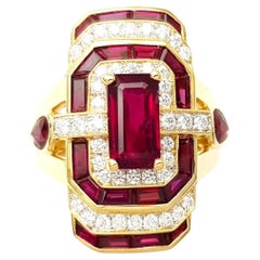 Ruby and Diamond Ring set in 18K Gold Settings