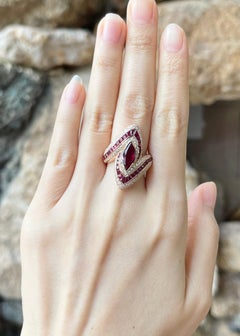 Ruby and Diamond Ring set in 18K Rose Gold Settings