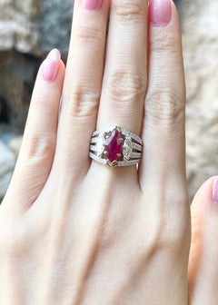 Ruby and Diamond Ring set in 18K White Gold Settings