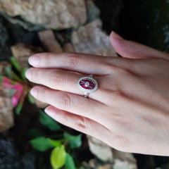 Ruby and Diamond Ring set in 18K White Gold Settings