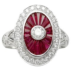 Anillo de rubíes y diamantes engastados en oro blanco de 18 quilates