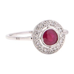 Ruby and Diamond Round Halo Ring in 18 Carat White Gold