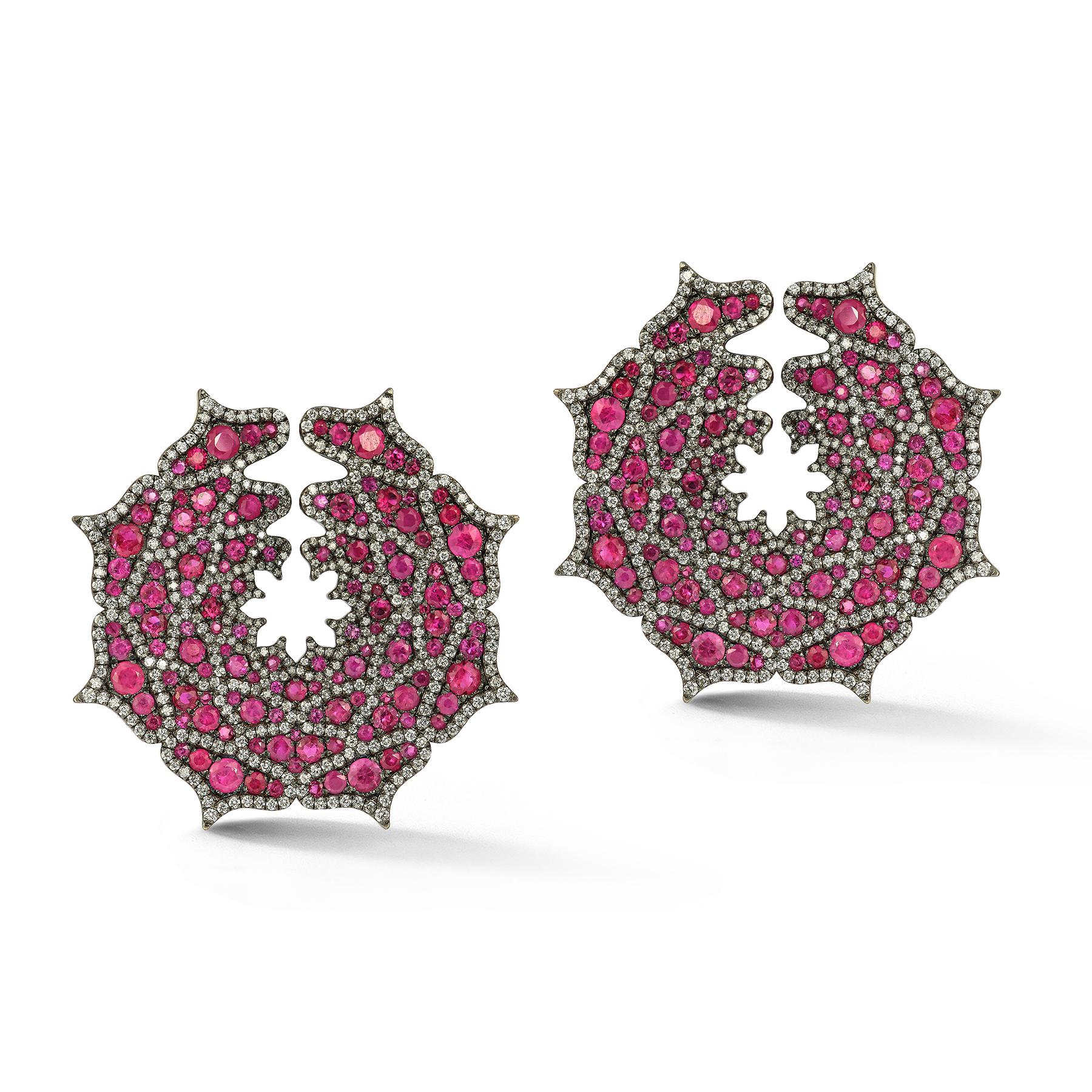 Ruby and Diamond Spider Web Spiral Earrings 

Round cut rubies & diamonds in a spider web motif 

Diamond Weight: 4.19 cts
Ruby Weight: 11.5 cts 

Back Type: clip on with post 

Measurements: 1.5