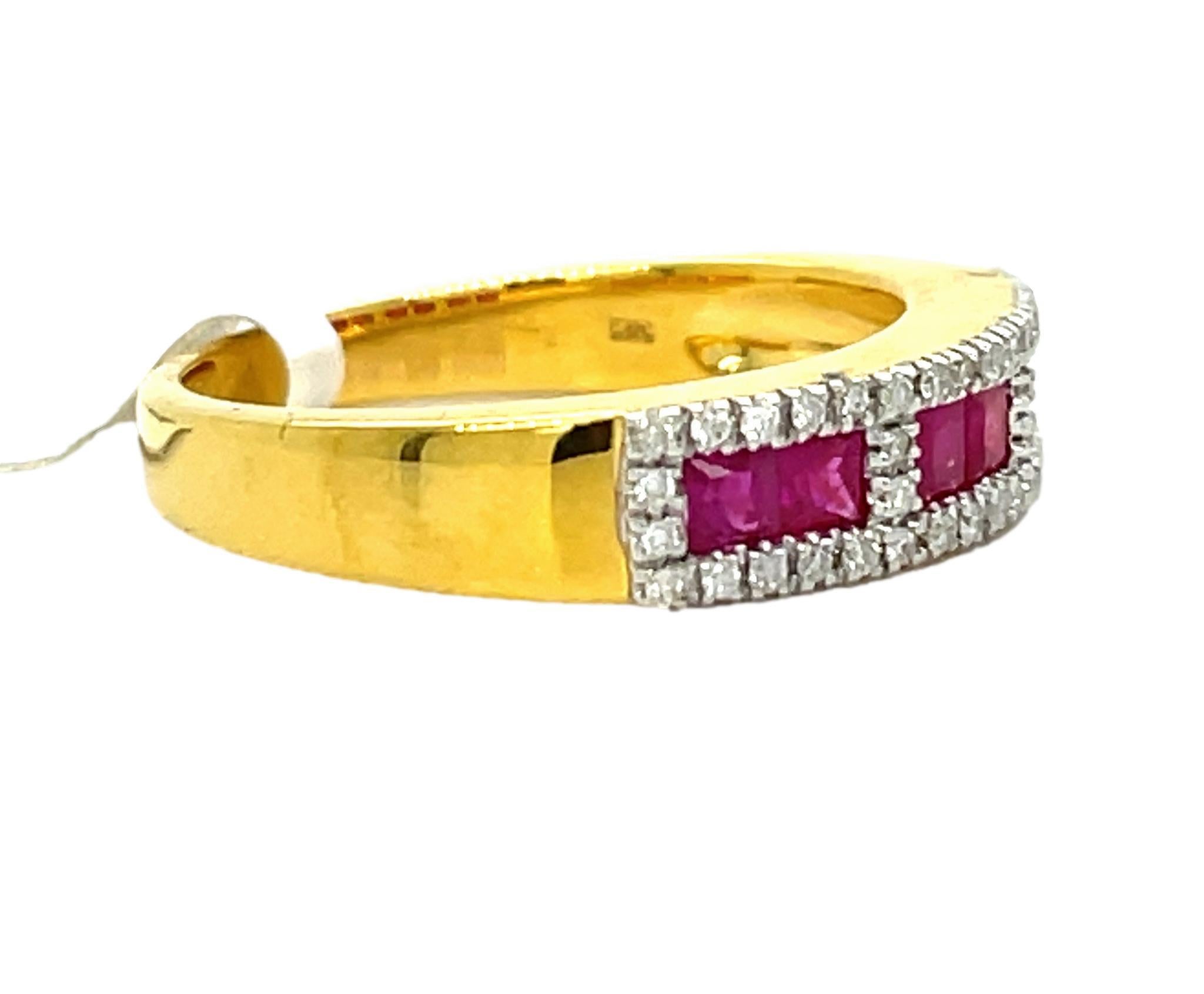 This beautiful natural Ruby and diamond ring is set in 14 karat yellow gold. This ring can be stacked with other rings or worn alone. There are 6 princess cut natural rubies surrounded by sparkling diamonds for a delicate accent. This ring will be