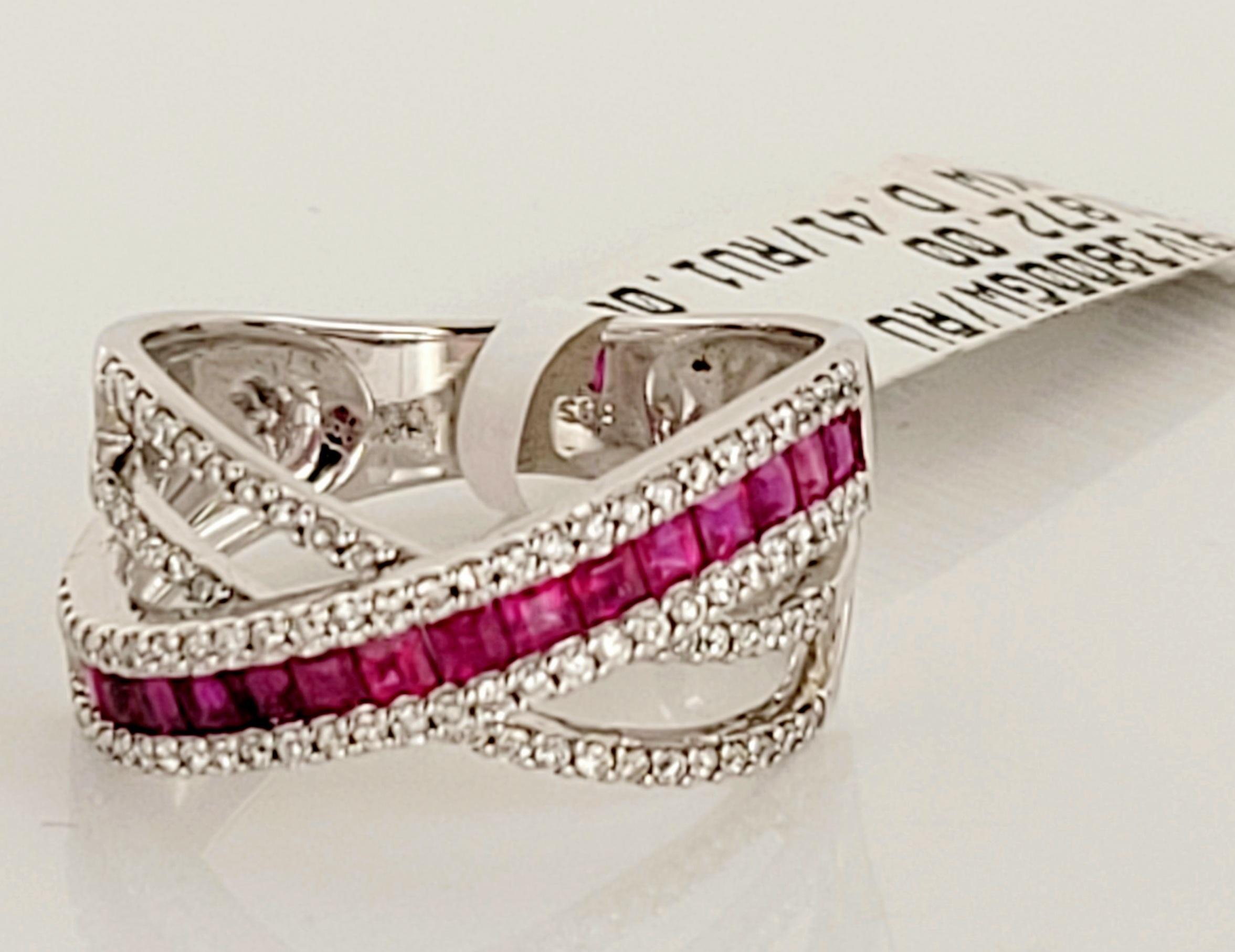 Exquisite, beautiful, fine Ruby and Diamond Ring
Material 14K White Gold
Diamond  0.41ctw
Ruby 1.08ctw
Ring Size 6.75
Weight: 4.9 grams
Gender Women 
Condition New, never worn 
Ring is not Sizable
