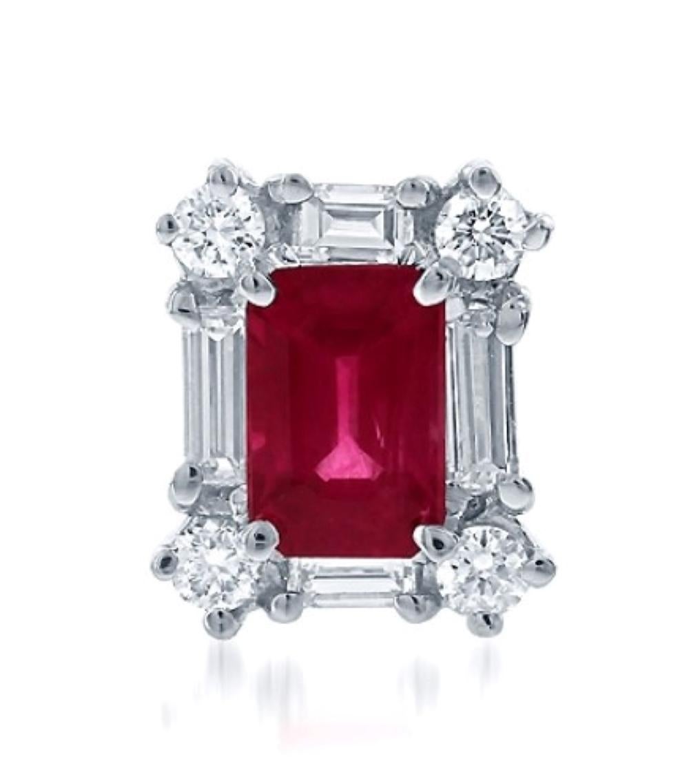 Incredible ruby and diamond earrings. These beautiful rubies with even, deep color saturation are sure to stand out in the ear. 

The two rubies combine for 2.40ct. A combination of round brilliant cut and straight baguette diamonds total 1.50ct.