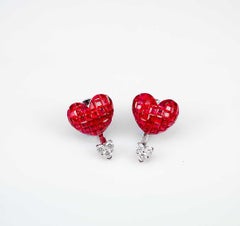 Boucles d'oreilles rubis et diamants en or blanc 18 carats