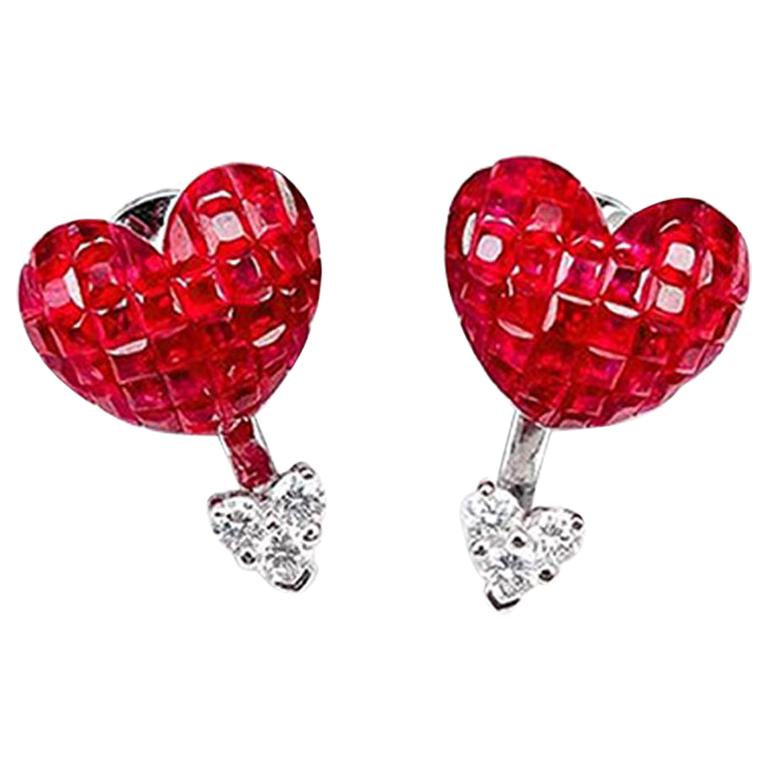 Clous d'oreilles en or blanc 18 carats avec rubis et diamants