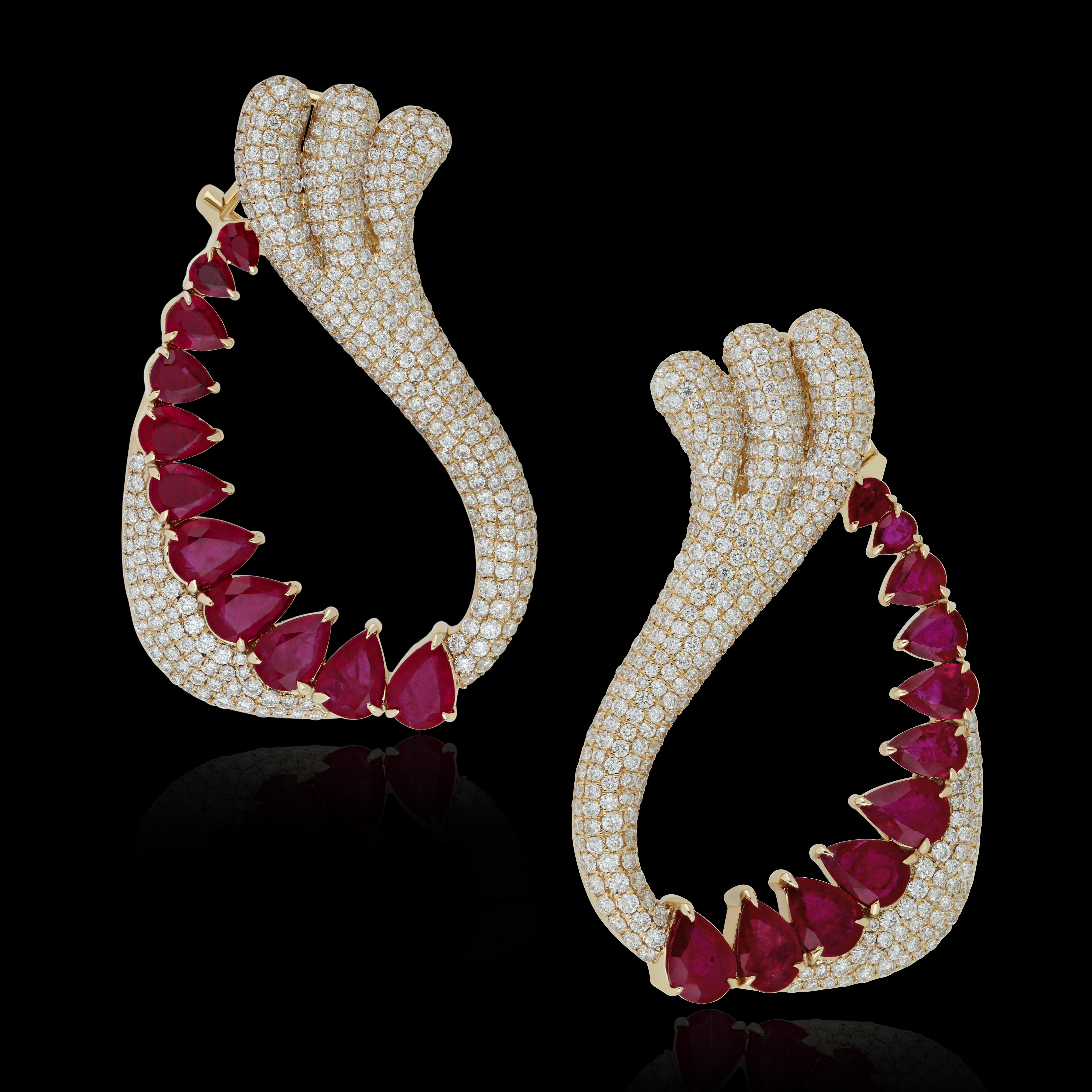 Elegant and Exquisitely detailed 14k Yellow Gold Earring with 10.5 Cts (approx.) Pear shape   Ruby and accented with Micro pave set Diamonds, weighing approx.  4.85 CT's (approx.). total carat weight to further enhance the beauty of the Earring.