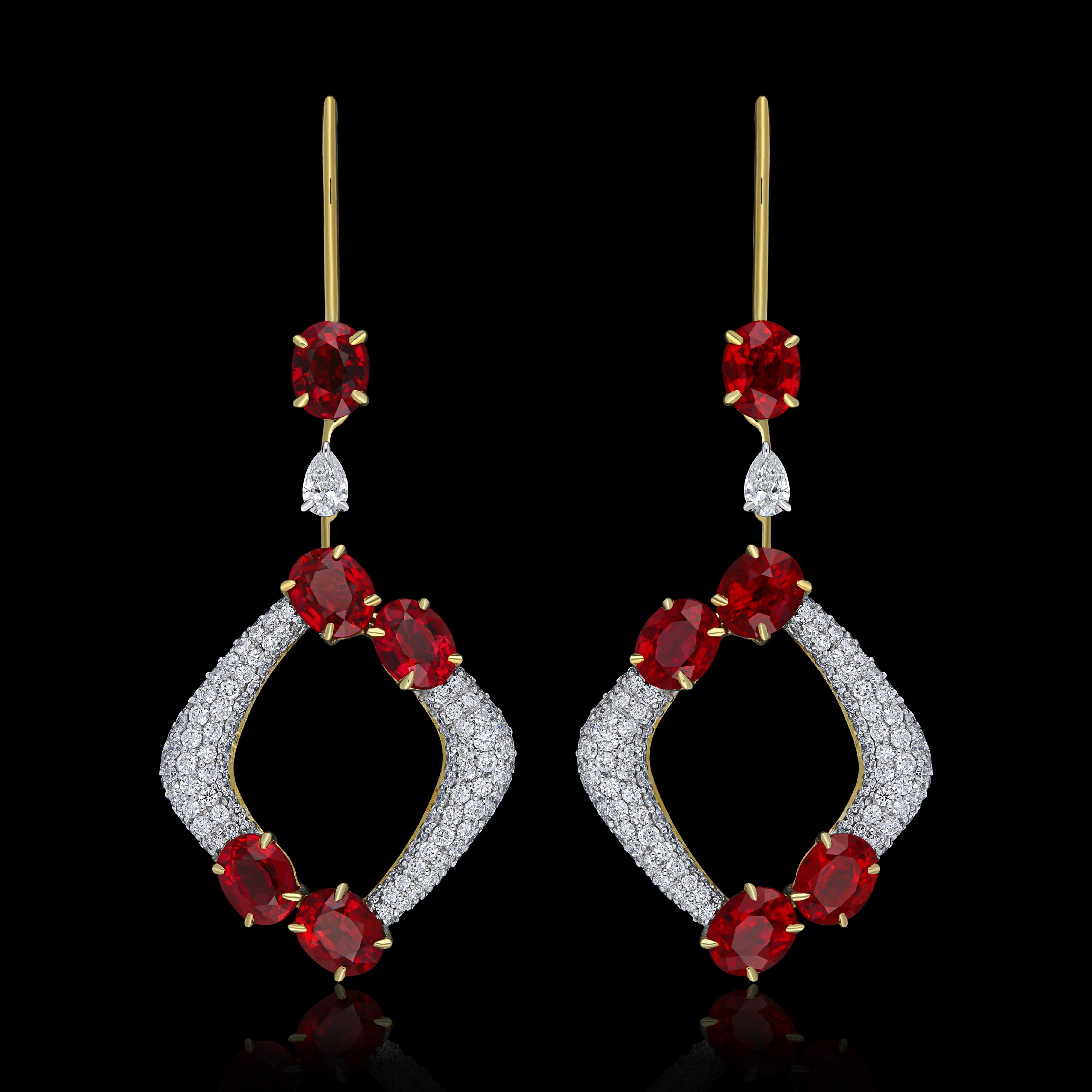 Elegant and exquisitely detailed 18 Karat White Gold Earring, center set with 4.45Cts .Oval Blood Red Ruby Burma and micro pave set Diamonds, weighing approx. 0.97Cts Beautifully Hand crafted in 18 Karat White Gold.

Stone Detail:
Ruby Burma: