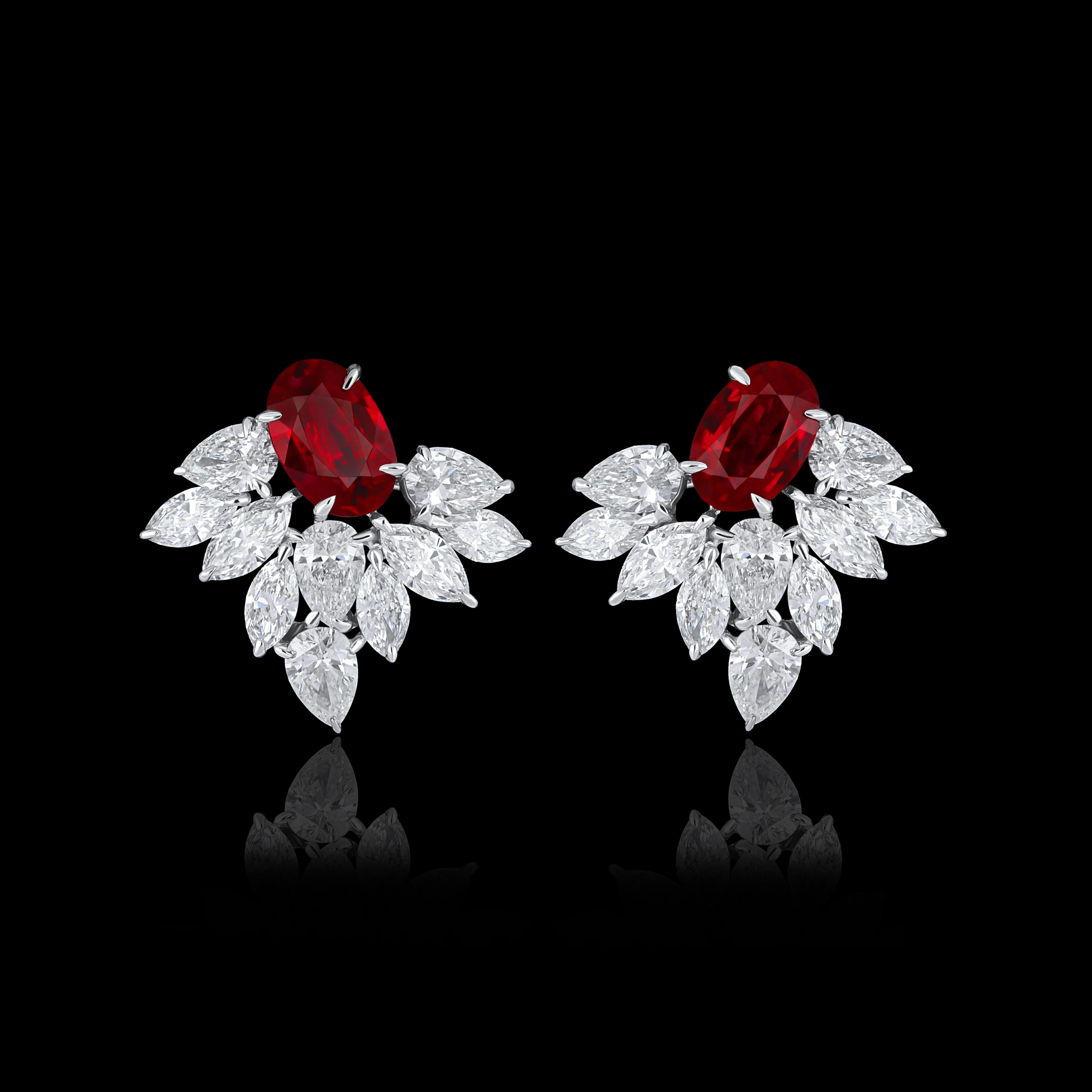 Elegant and exquisitely detailed 18 Karat White Gold Earring, center set with 0.97Cts .Oval Shape Ruby and micro pave set Diamonds, weighing approx. 1.49Cts Beautifully Hand crafted in 18 Karat White Gold.

Stone Detail:
Ruby GR: 6X4MM

Stone