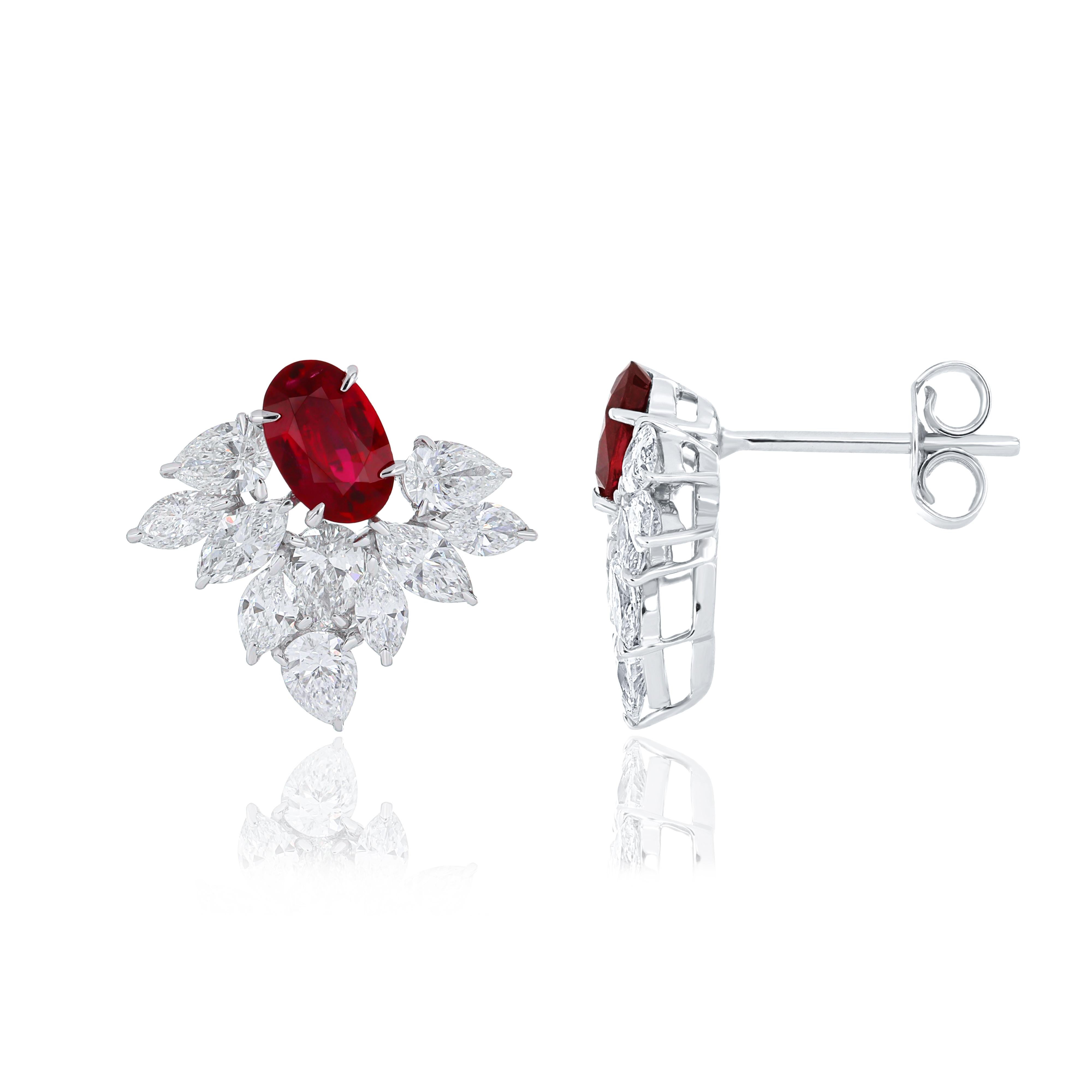 Oval Cut Ruby and Diamond Studded Earrings in 18 Karat White Gold For Sale