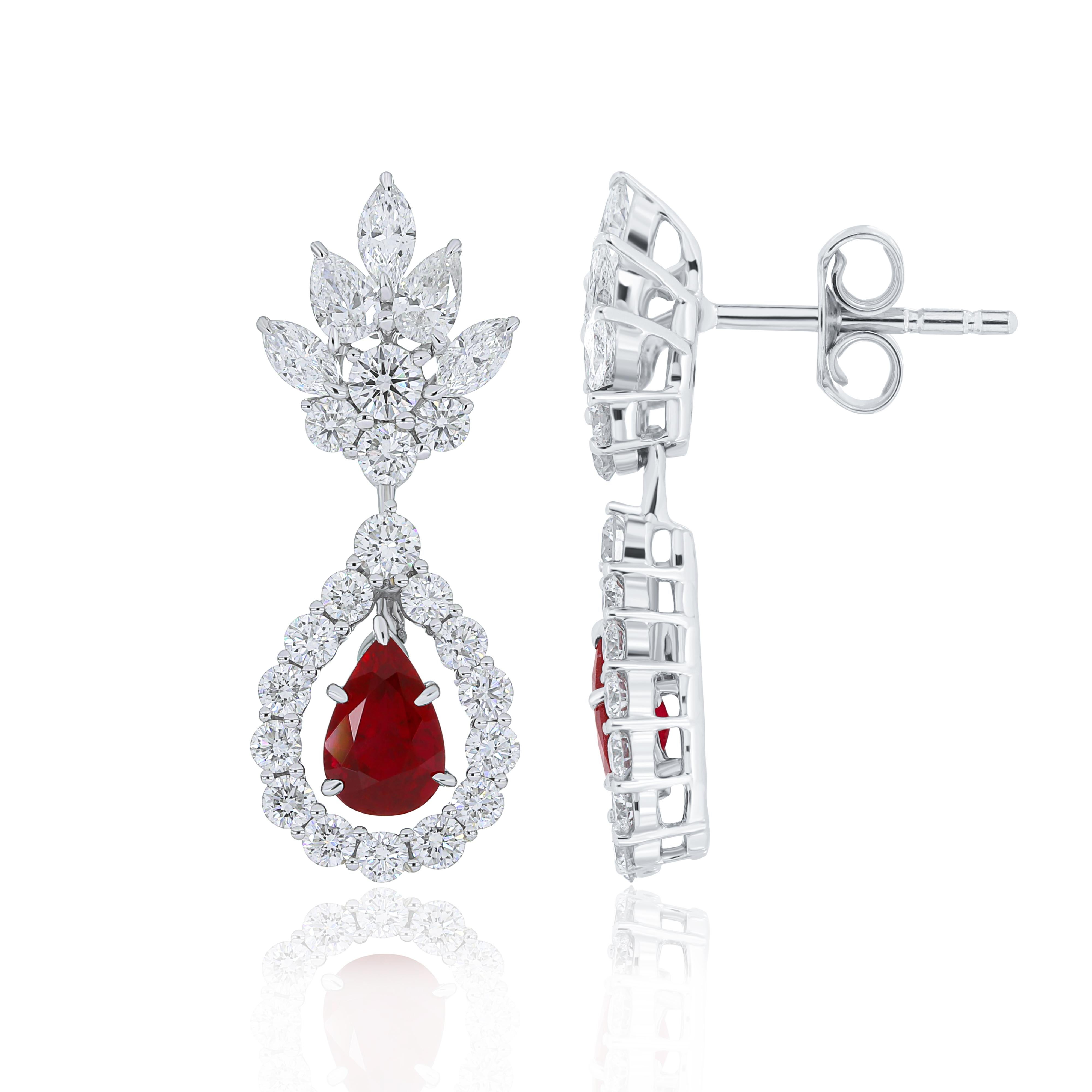 Pear Cut Ruby and Diamond Studded Earrings in 18 Karat White Gold For Sale