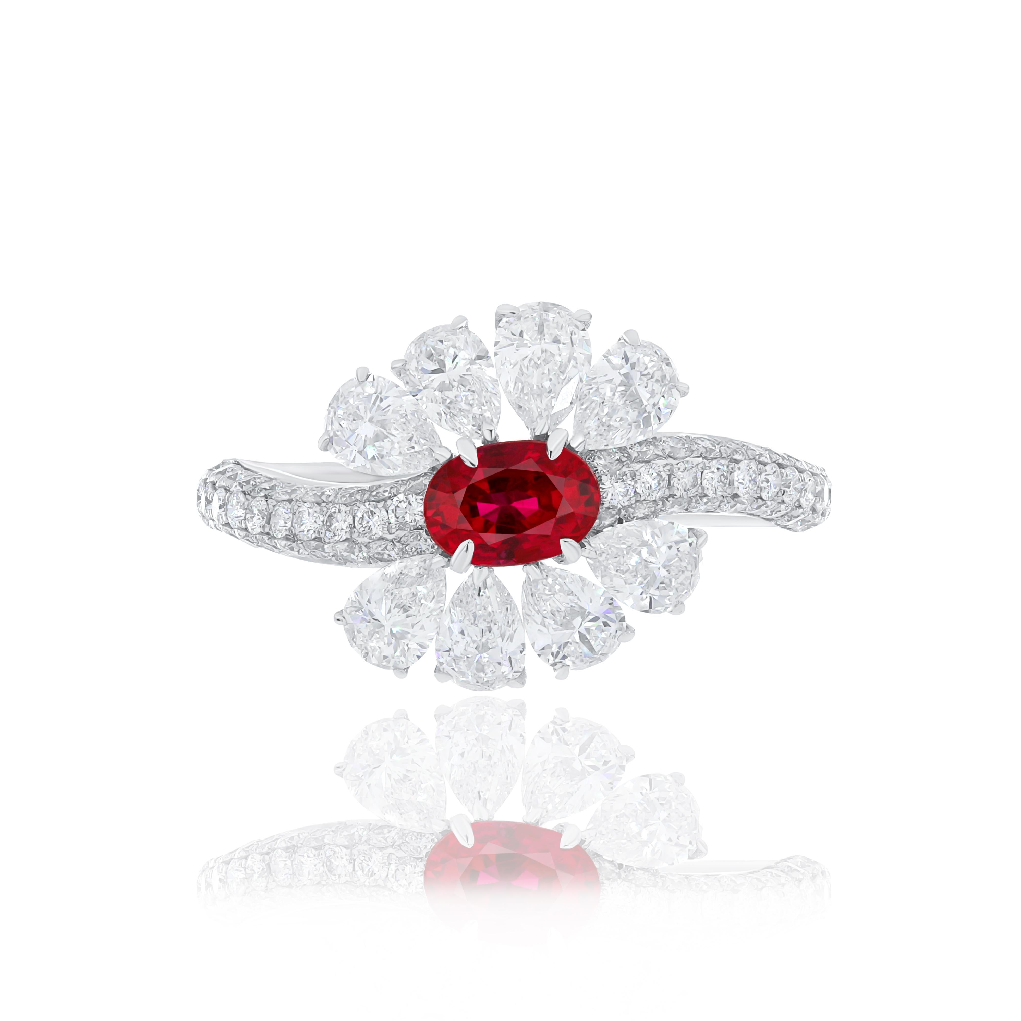 Elegant and exquisitely detailed 18 Karat White Gold Ring, center set with 0.65 Cts .Oval Shape deep red natural Ruby and micro pave set Diamonds, weighing approx. 2.11 Cts Beautifully Hand crafted in 18 Karat White Gold.

Stone Detail:
Ruby Burma: