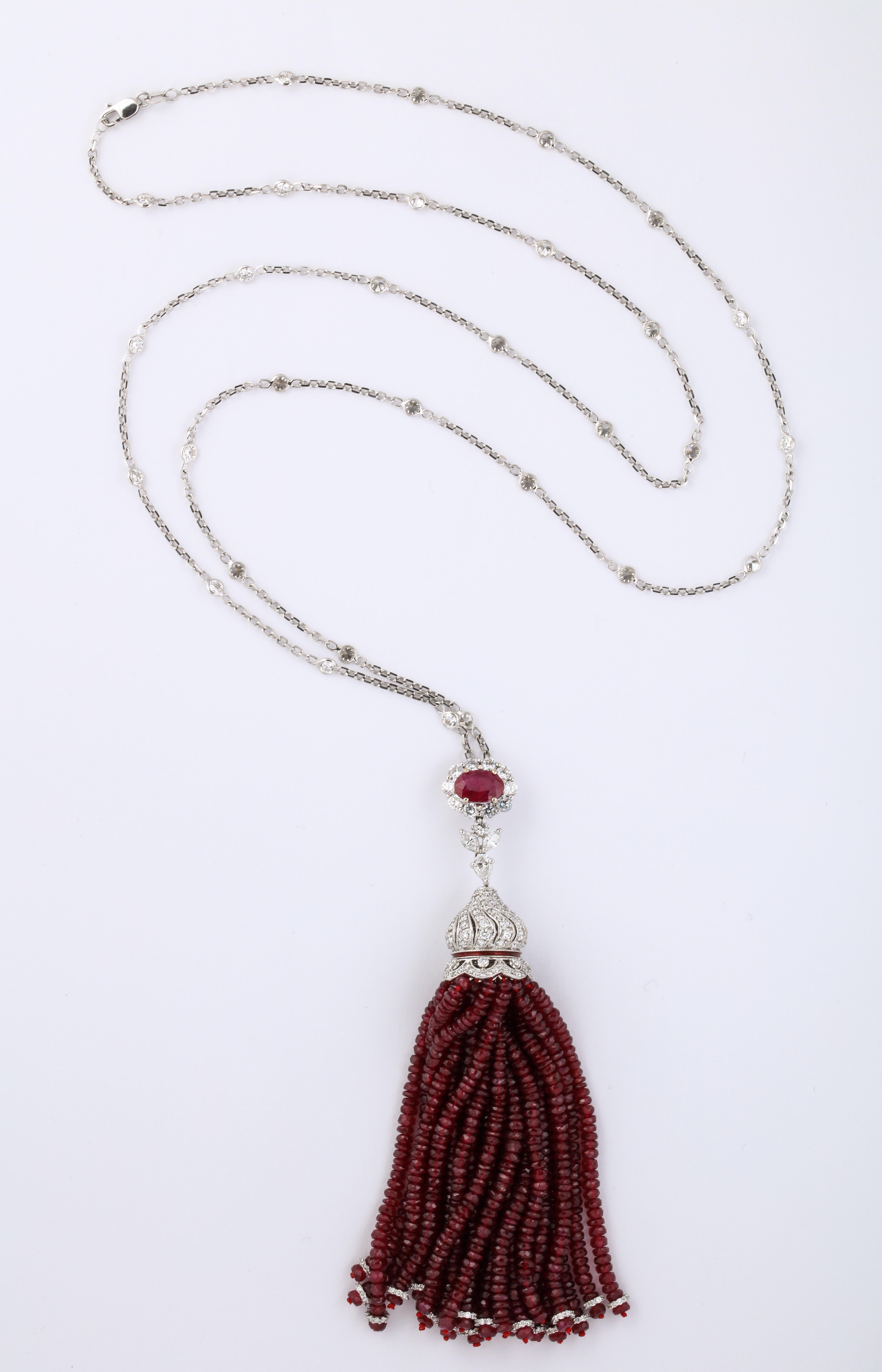 
An important Ruby and Diamond Tassel Necklace

175 carats of fine Ruby and 8.38 carats of white round brilliant diamonds. 

30 inch removable diamond by yard chain, set in white gold. The tassel measures 4 inches in length. 

A fabulous piece of
