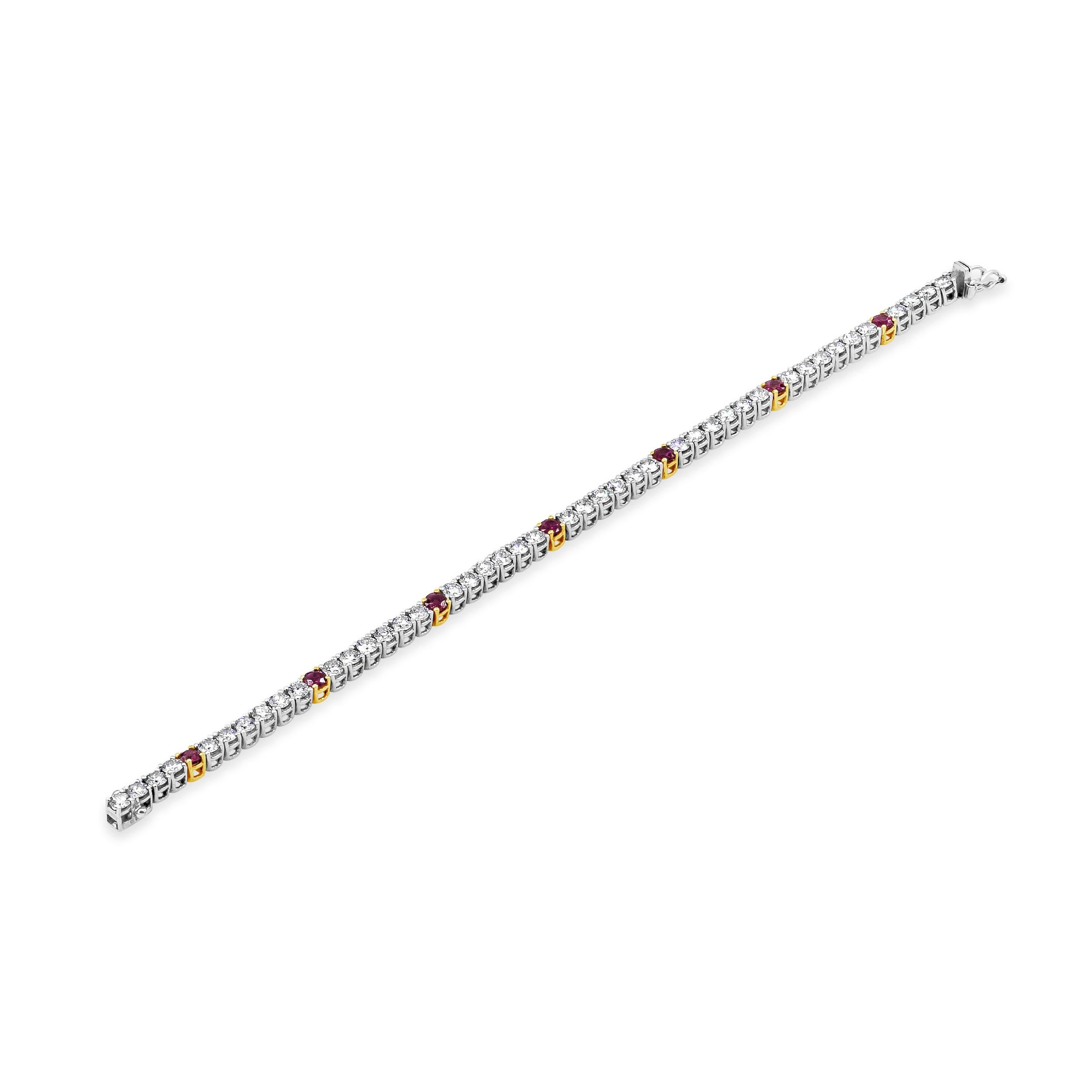 Features a row of round brilliant diamonds, elegantly spaced with round rubies every sixth diamond. Diamonds weigh 4.90 carats total; rubies weigh 1.40 carats total. Made in 18 karat white gold.

Style available in different price ranges. Prices are
