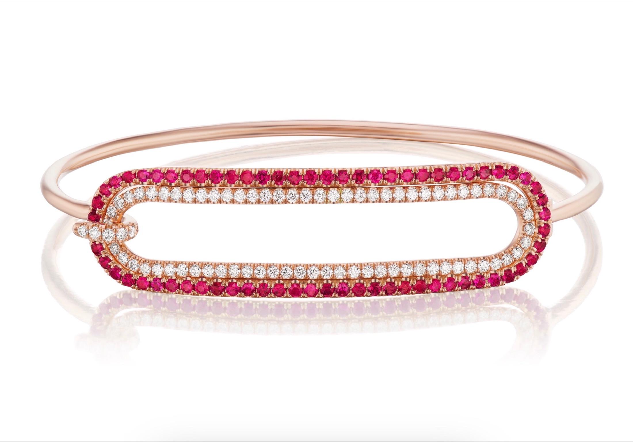Andrew Glassford's 2mm Tension Bracelet in 18K rose gold with 1.20 carats of rubies and .73 carats of GH VSI Diamonds that creates a stunning 