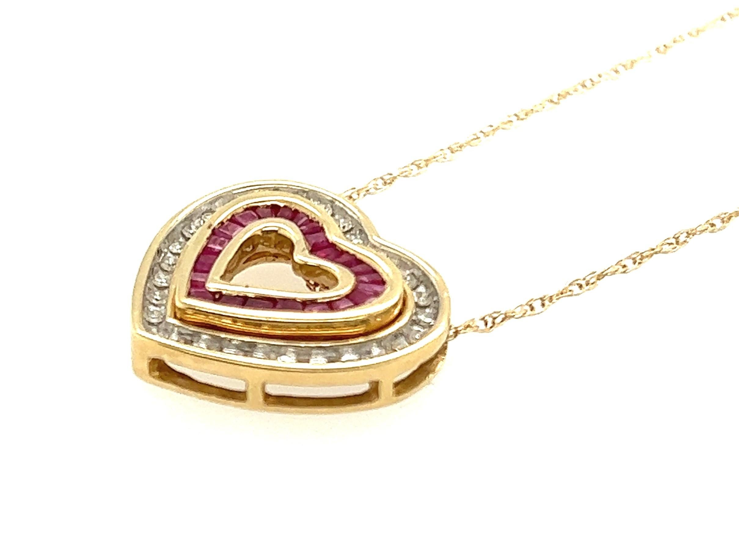 10kt yellow gold three-in-one heart pendant with 0.28tcw H-I/I1-I2 Diamonds and 0.32tcw Ruby Double Heart Necklace 18