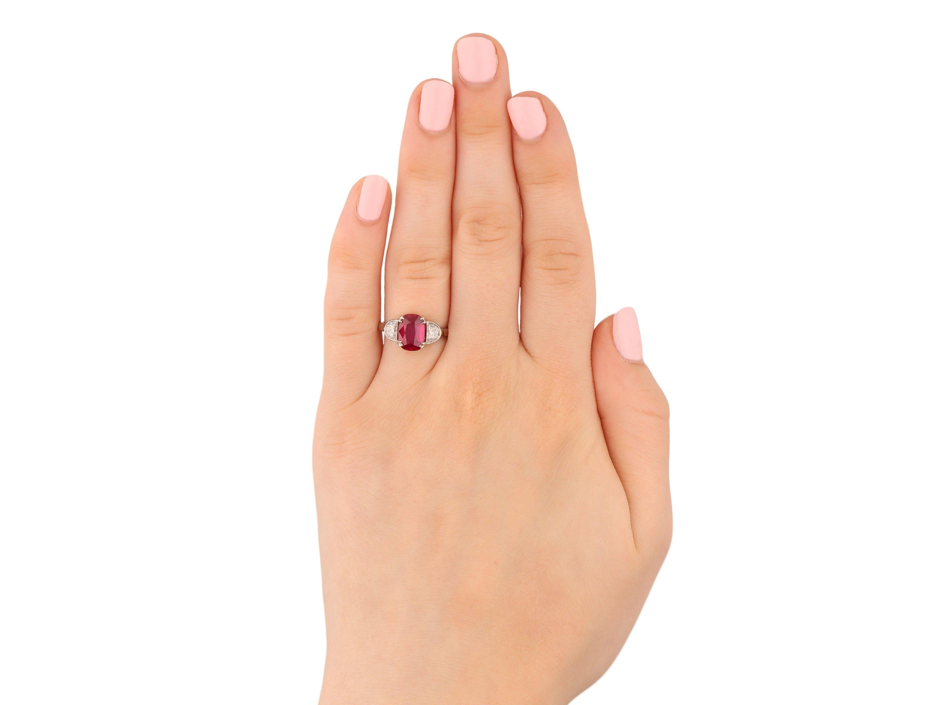Women's Ruby and diamond three stone ring, circa 1990 For Sale