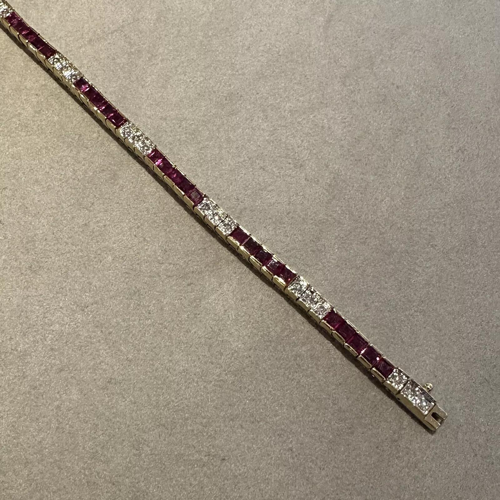 Ruby and Diamond Vintage Line Tennis Bracelet in 18k Yellow/White Gold 

Ruby and Diamond Bracelet features sections of Square cut Natural Rubies set with Round Brilliant Diamonds. The bracelet is 18k Yellow Gold with Diamonds set in 18k White Gold.