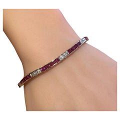 Bracciale Tennis Vintage Line con rubini e diamanti in oro giallo e oro bianco 18 ct.