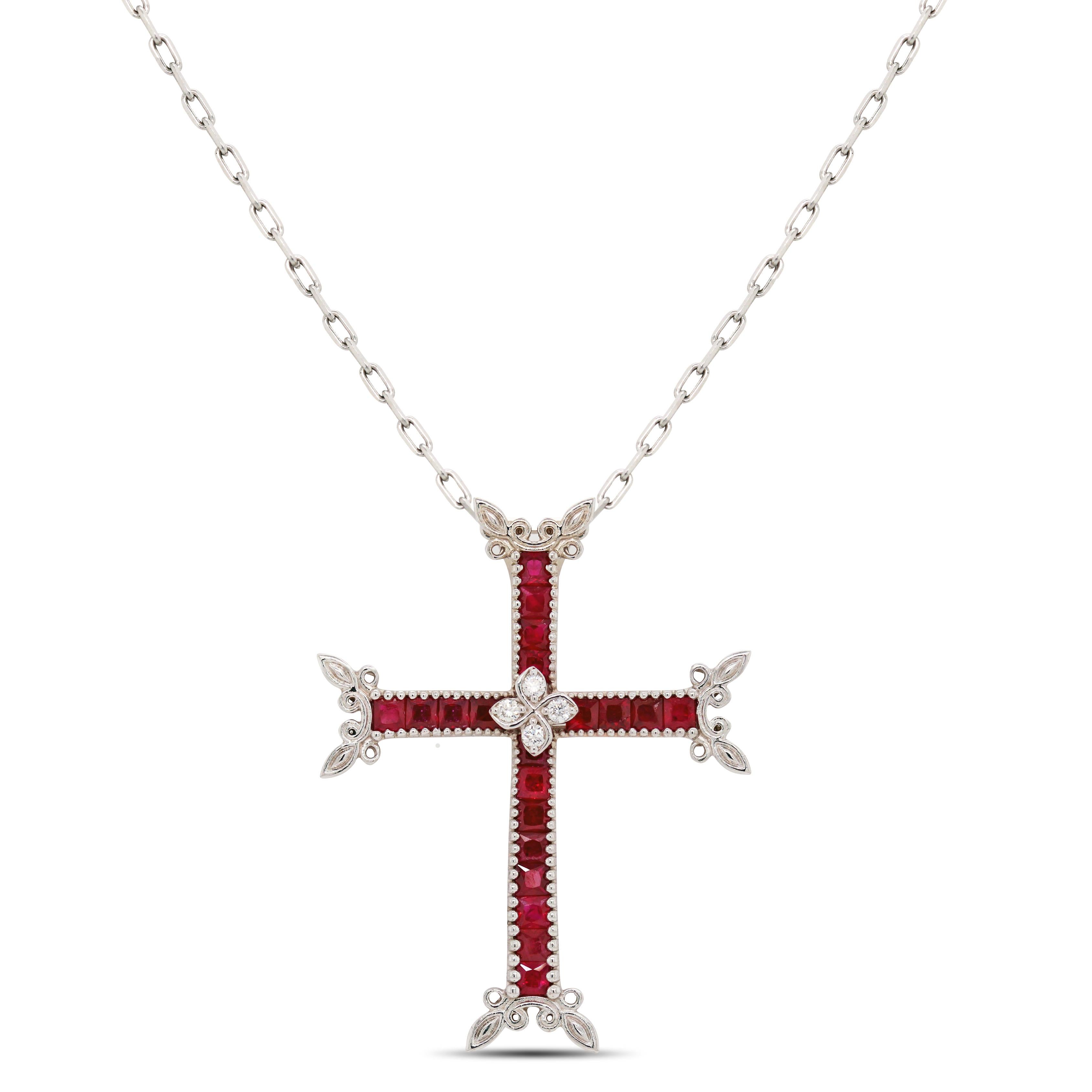 Stambolian 18K White Gold Diamond Princess Cut Ruby Cross Pendant Necklace

This unique take on a cross is inspired by the Armenian cross with the floral corners

2.50 carat Rubys total weight. Rubys are all princess cut.

Diamonds are set in the