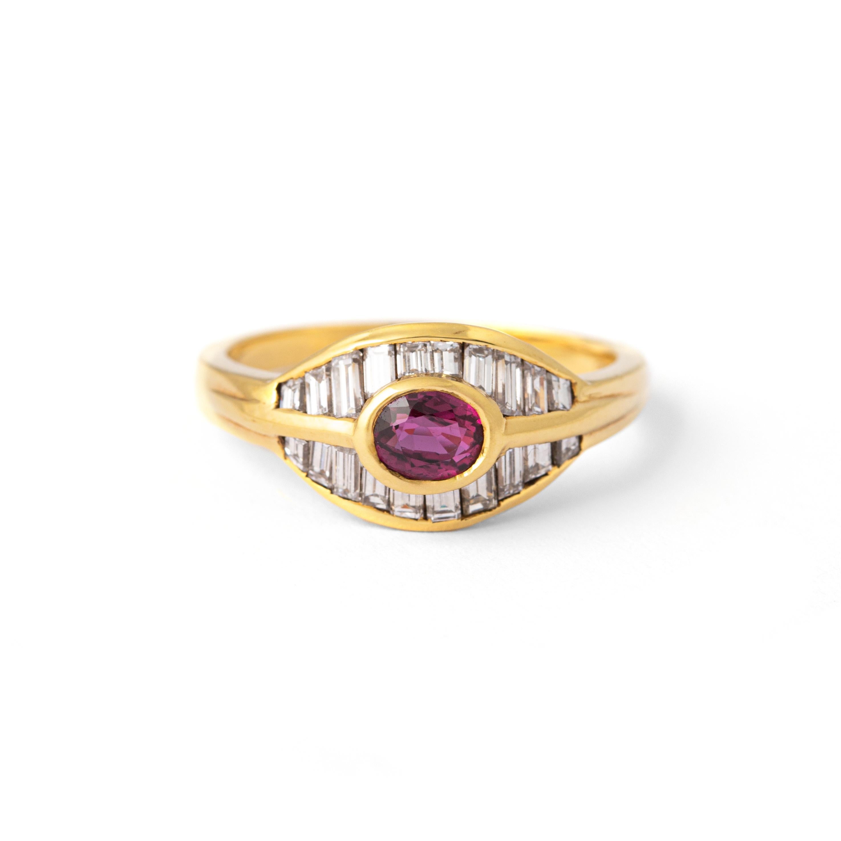 Ruby and Diamond Yellow Gold 18K Ring
Centered by an oval Ruby of 0.54 carat and 20 Diamond of 0,69 carat total estimated F color and VVS2 clarity .

Size: 6.5
Total weight: 4.06 grams.
